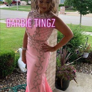 Women’s evening dress. Size 6. Pink featuring a stunning beaded neckline.